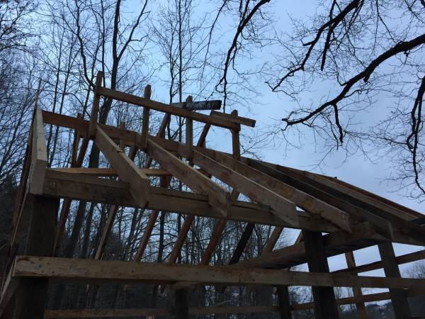 Cupola and rafters are up.